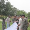 Flag manufacturing and hoisting